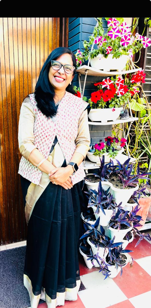 Rekha among her garden plants